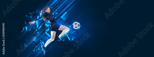 Poster with young woman, female soccer player playing football with ball isolated on blue background with polygonal and fluid neon elements. Sport concept © master1305