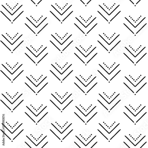 Tribal mud cloth African inspired ethnic hand drawn vector seamless pattern. Folk traditional black and white ornament. Boho vertical stripes background for home fabric textile wall paper design.