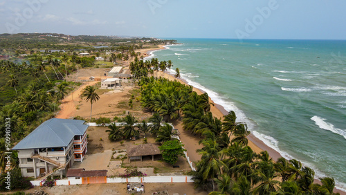 Aerial view of buildings along the coastline near the beach, Lamina, Ghana.
