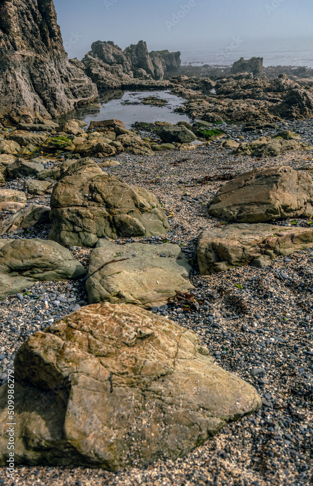 The Peninsula of Howth Head on a foggy day, the cliffs warped by fog, Dublin, Seashore of  cliffs, bays and rocks landscape, dangerouse cliffs, spectacular views in Ireland , Ireland