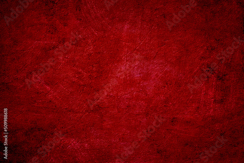 A red old wall cement grunge texture background.