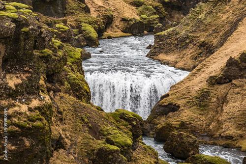 The mighty cascade of Steinbogafoss waterfall in early spring  Laugavegur hiking trail  Iceland