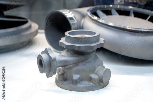 Model object of a large industrial part printed on a 3D printer from metal close-up. New modern progressive additive 3D printing technology. Industry factory plant manufacturing metalwork industrial