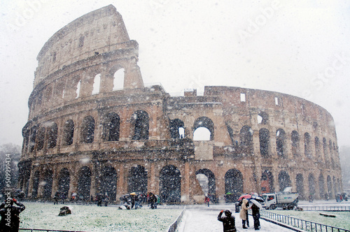 Photography The Colosseum under heavy snow, Rome Italy