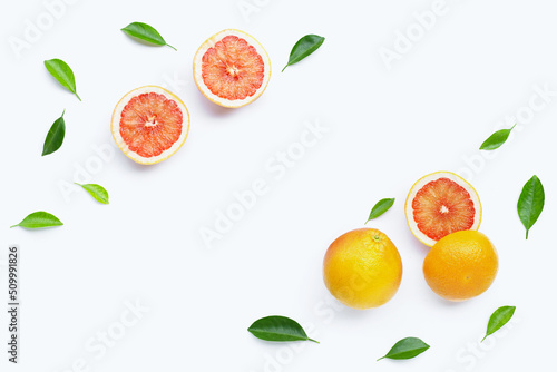 Grapefruit with leaves on white