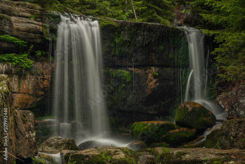 Waterfall of Jedlova creek in Jizerske mountains in spring morning