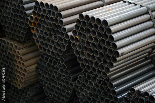high quality steel pipe or Aluminum and chrome stainless pipes in stack waiting for shipment in warehouse