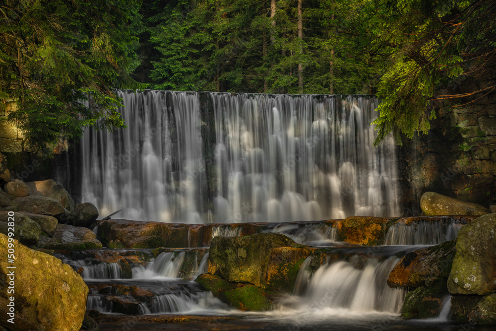 Dziki waterfall in Karpacz town in Krkonose mountains in spring fresh morning