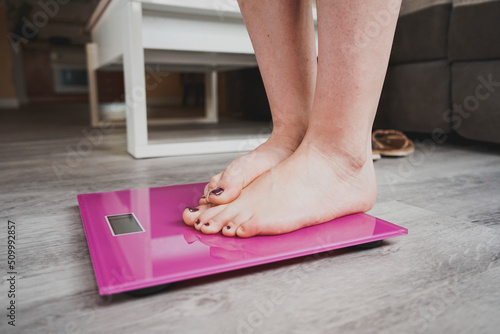 conceptual image about insecurities in women about weigh and eating disorders photo
