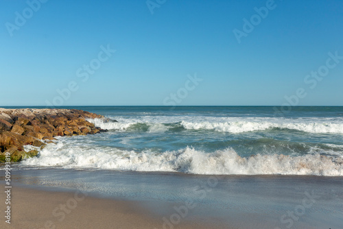 photo of rock breakwater at mar del plata beach, Argentina