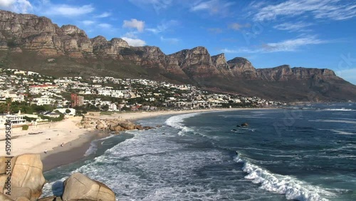 Aerial view of Camps Bay beach during summer in Cape Town, South Africa.