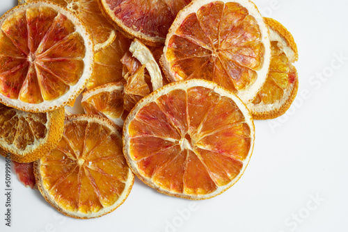 Natural Dried Oranges Slices Snack. Dried Oranges for baking. Dried grapefruit  slices and dried candie citrus fruit.  Isolated white background.