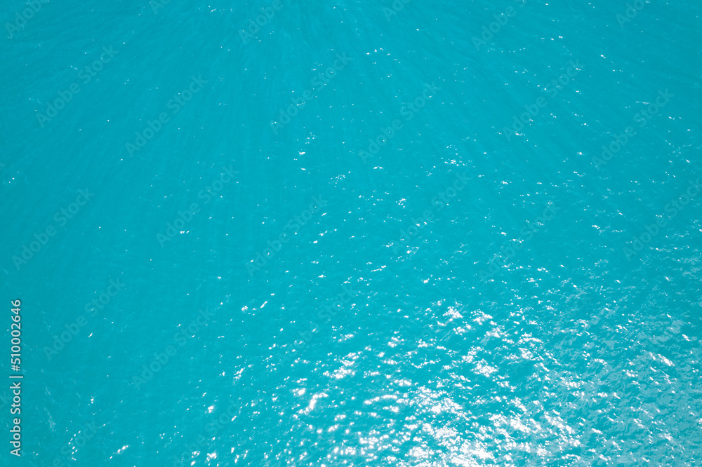 Sea surface aerial view,Bird eye view photo of blue waves and water surface texture, Turquoise sea background Beautiful nature Amazing view seascape background