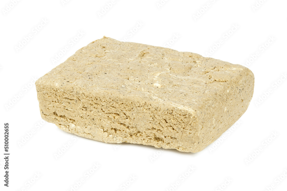 Oriental sweet dessert - halva. A product made from nuts and seeds.