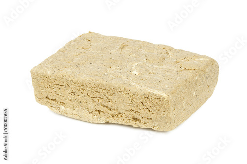 Oriental sweet dessert - halva. A product made from nuts and seeds.