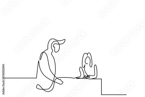 a man is standing at the hotel reception where he is on vacation and a female employee is checking in