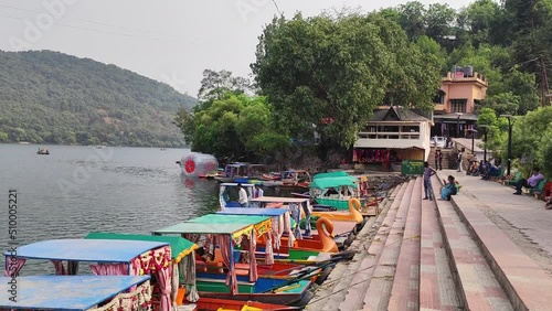 Colorful boats moored at lake  photo