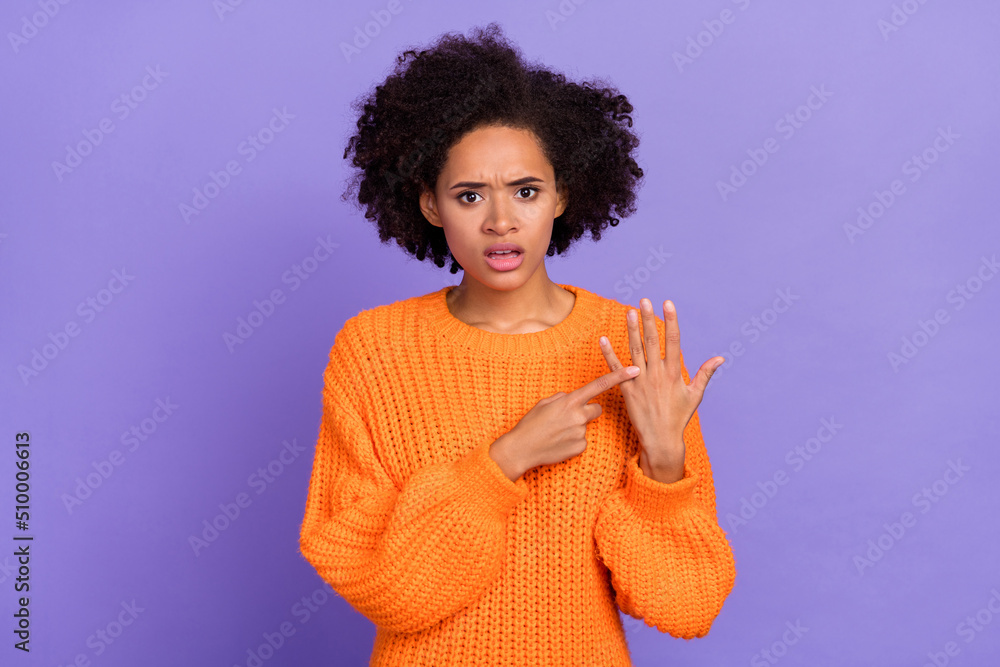 Portrait of attractive desperate girl showing empty finger no wedding ring isolated over bright purple violet color background Portrait of attractive desperate girl showing empty finger no wedding ring isolated over bright purple violet color background