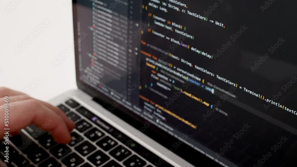 Coding on the screen, HTML encoding and programming on a laptop screen ...