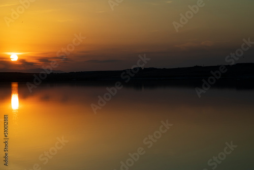 Summer beautiful sunset on the lake of Azerbaijan