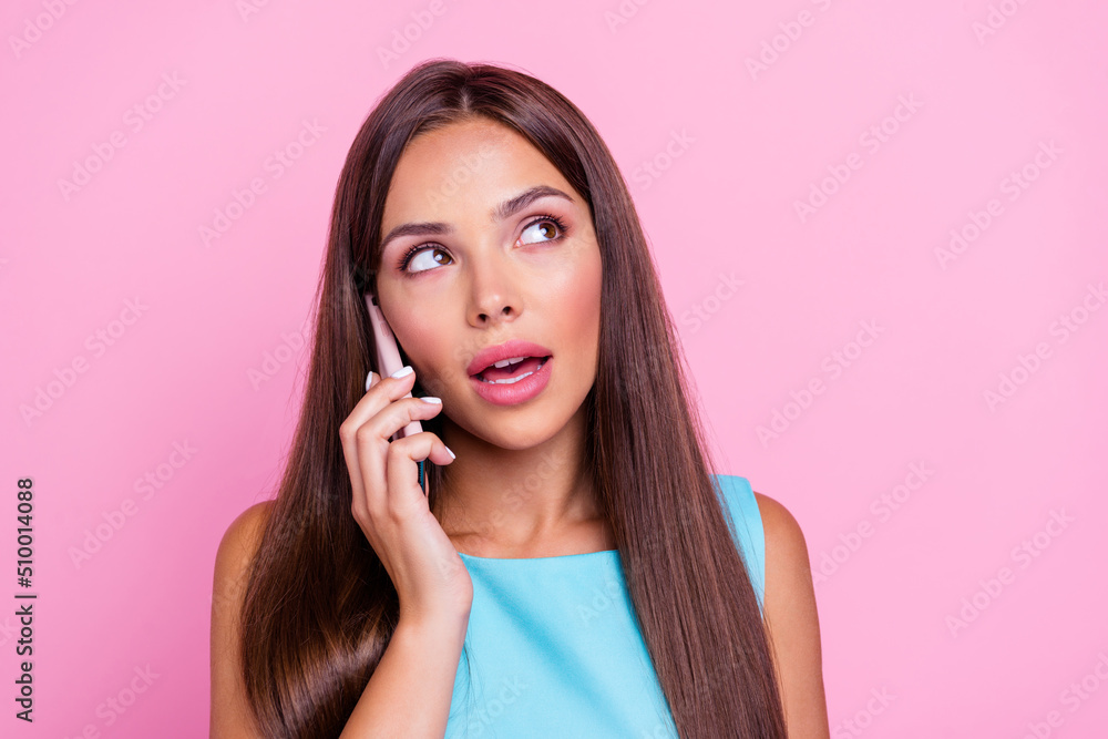 Photo of dreamy cute lady dressed teal outfit communicating modern gadget looking empty space isolated pink color background Photo of dreamy cute lady dressed teal outfit communicating modern gadget looking empty space isolated pink color background