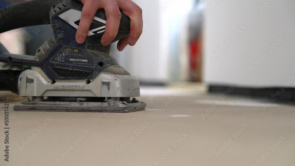 Polishing Concrete Floor Surface With Sander Polishing Concrete Floor Surface With Sander