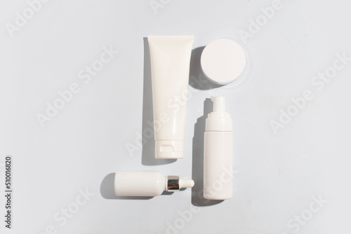 mockup of perfume skin care bottle cosmetic tube of beauty makeup facial, treatment cleanser face foam, beauty healthcare branding packaging