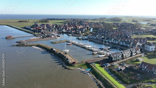 Wallpaper Mural Peninsula Marken in the municipality of Waterland harbour. Old dutch historic fishing village in the Markermeer. European dutch culture, old wooden houses. Touristic attraction. Torontodigital.ca