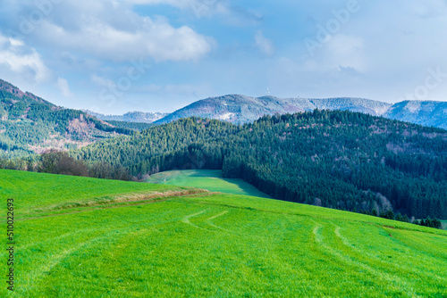 Germany, Schwarzwald nature landscape panorama view with snow covered mountain tops in springtime at sunset, a beautiful tourism destination for vacation