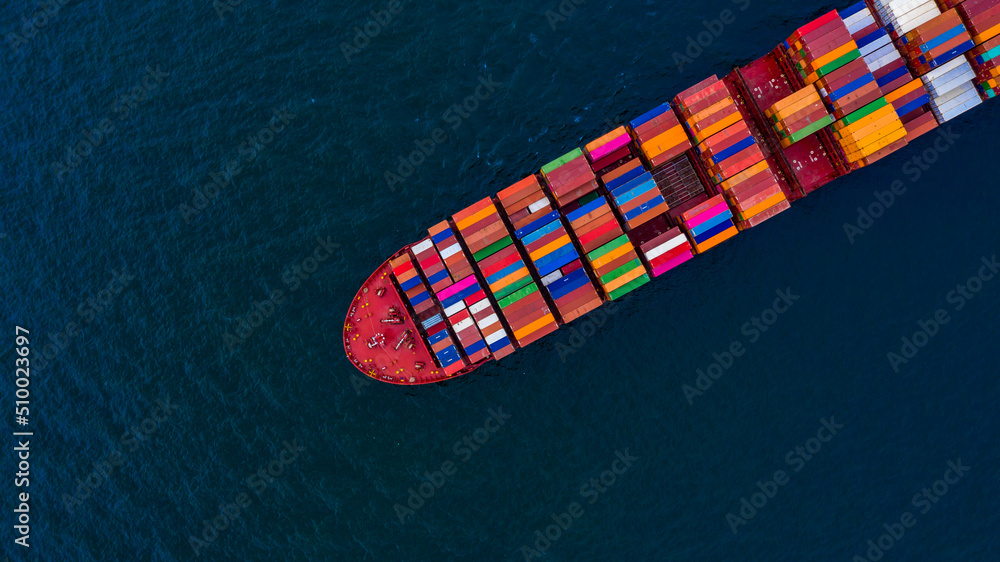 Aerial view container ship at terminal commercial seaport freight shipping maritime vessel, Global business supply chain import export logistic transportation oversea worldwide by container cargo ship Aerial view container ship at terminal commercial seaport freight shipping maritime vessel, Global business supply chain import export logistic transportation oversea worldwide by container cargo ship