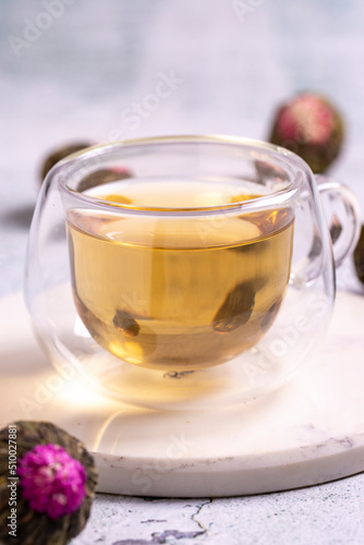 Jasmine tea balls isolated on white background. Flowering tea or blooming tea. close up