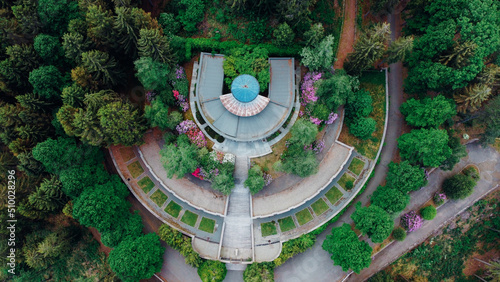 Aerial view of The Monumental Cemetery of Craviolo, in the Province of Biella, Piedmont, Italy. Semicircular architecture plan. Building surrounded by nature.