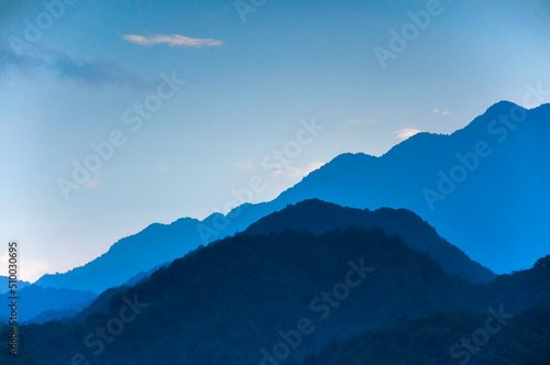 clouds over the mountains in sunset