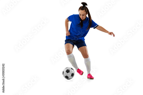 One sportive girl, female soccer, football player training isolated on white studio background. Sport, action, motion, fitness concept © master1305