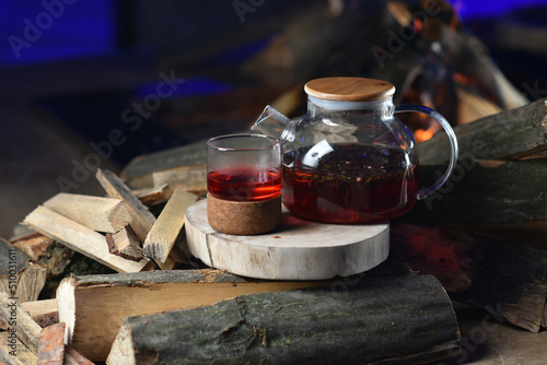 Fototapeta Naklejka Na Ścianę i Meble -  Pomegranate tea in a glass teapot
