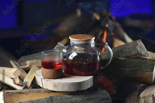 Pomegranate tea in a glass teapot 