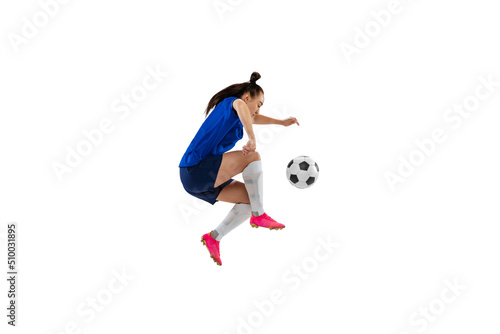 Studio shot of young female soccer, football player workout isolated on white studio background. Sport, action, motion, fitness concept © master1305
