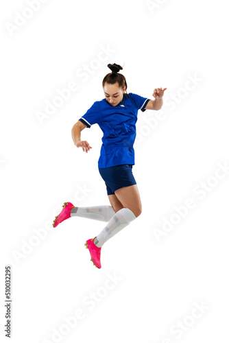 Studio shot of young female soccer, football player workout isolated on white studio background. Sport, action, motion, fitness concept