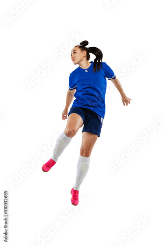 One sportive girl, female soccer, football player training isolated on white studio background. Sport, action, motion, fitness concept