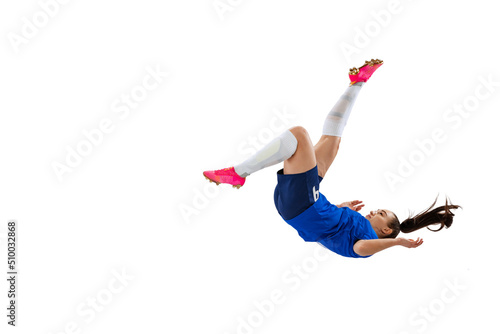 Studio shot of young female soccer, football player workout isolated on white studio background. Sport, action, motion, fitness concept