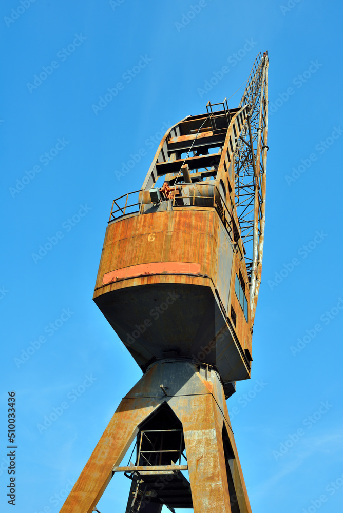 Fototapeta premium ancient crane in the port of Genoa Italy