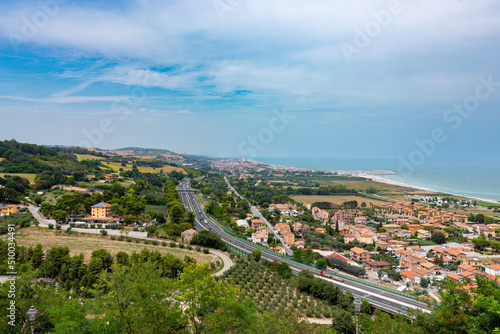 Vista from Torre di Palme to the villages of Marina Palmense and Santa Maria a Mare, over the E55 highway in Marche region in Italy.