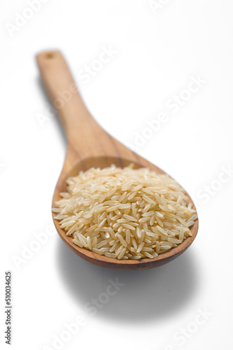  Brown rice in the wood spoon