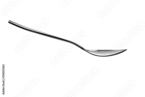 Foto The metal shiny spoon isolated on white