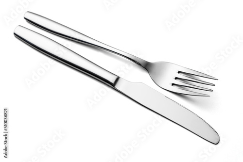 The metal shiny fork and knife on a white background.