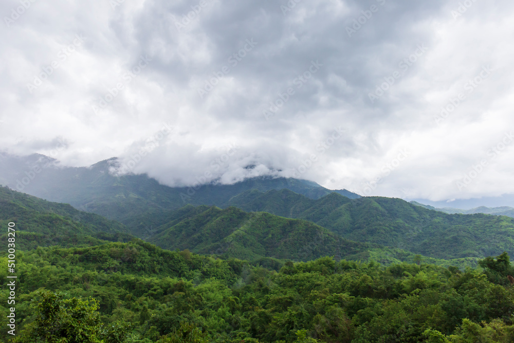 Misty landscape with green forests, fertile mountains. Misty landscape with green forests, fertile mountains.