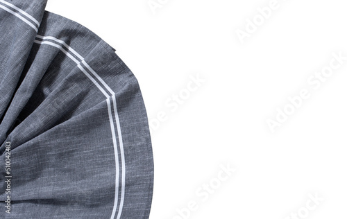 Blue napkin, tablecloth, fabric texture with creased folds isolated on white.