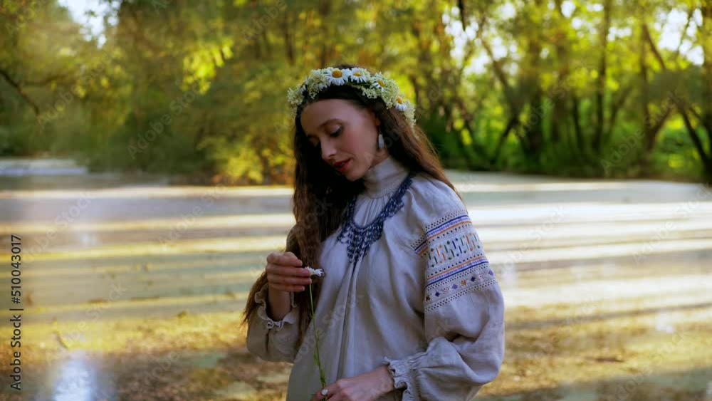 Beautiful girl in a boat. Young woman posing in a boat on the river. Lake in the woods. Beautiful girl in a boat. Young woman posing in a boat on the river. Lake in the woods.