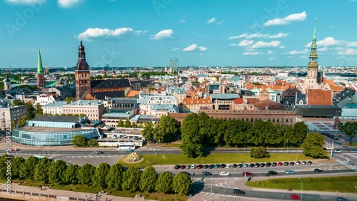 Aerial hyperlapse of the Riga city - the capital of Latvia. Beautiful time flow over Riga old town near Domes cathedral.