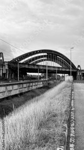 old historical bridge over the railroad